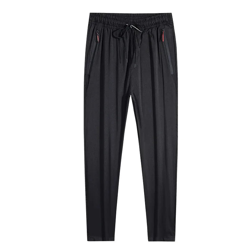 Calças casuais masculinas elásticas slim fit, calças de corrida com cintura elástica, estilo coreano, azul, preto, cinza, calças masculinas de marca plus size