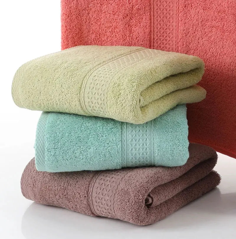 Nova toalha doméstica espessada 100% algodão puro, toalha de banho macia e absorvente para adultos, toalha grande para adultos em jacquard de cor lisa