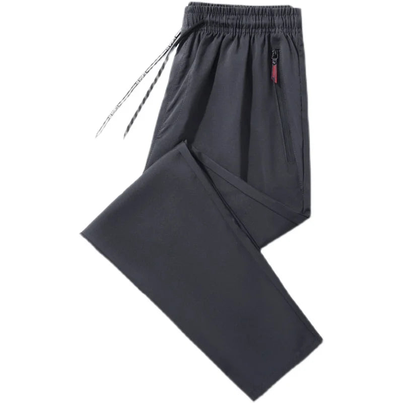 Calças casuais masculinas elásticas slim fit, calças de corrida com cintura elástica, estilo coreano, azul, preto, cinza, calças masculinas de marca plus size